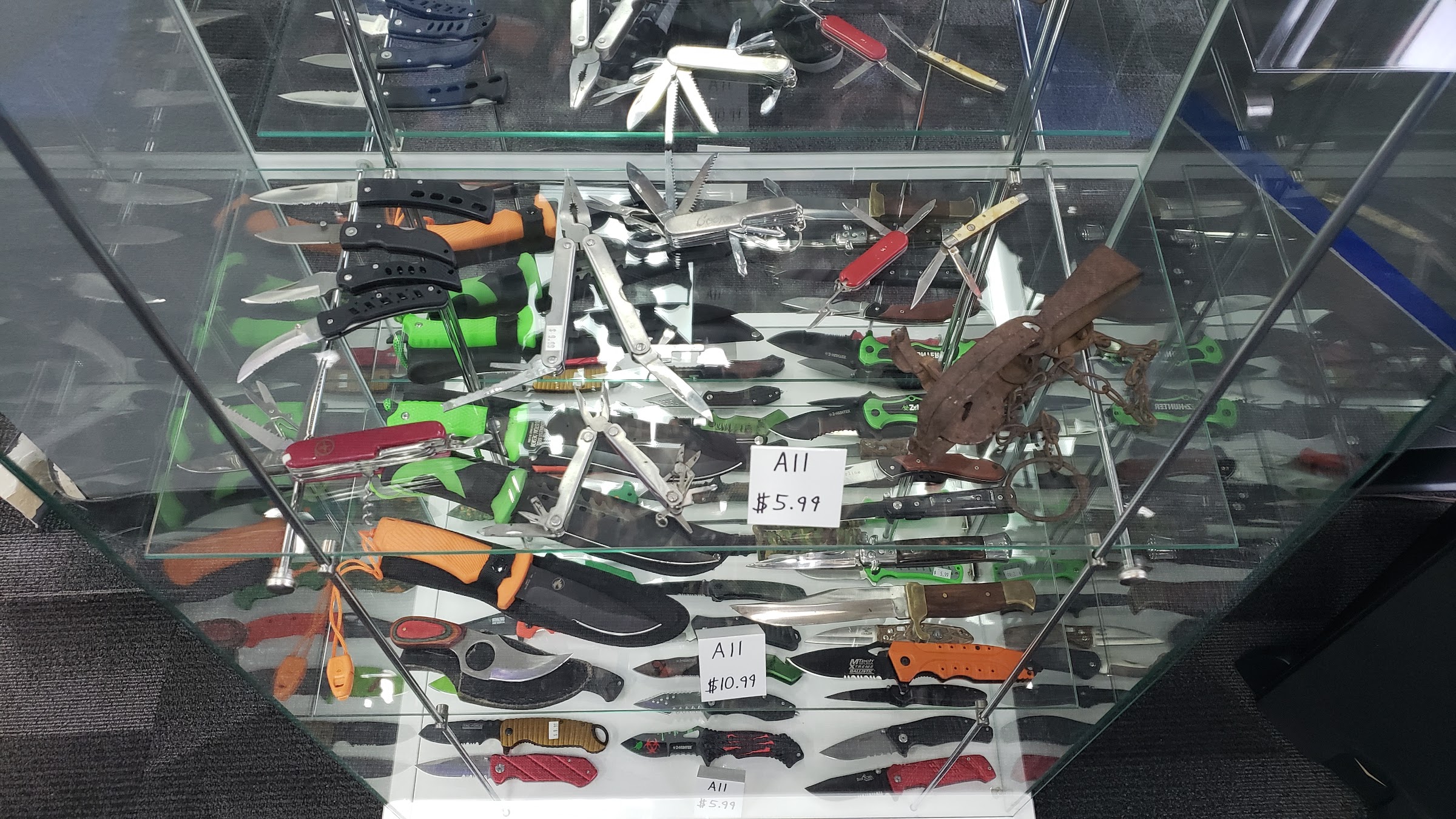 Display of multi-colored pocket knives